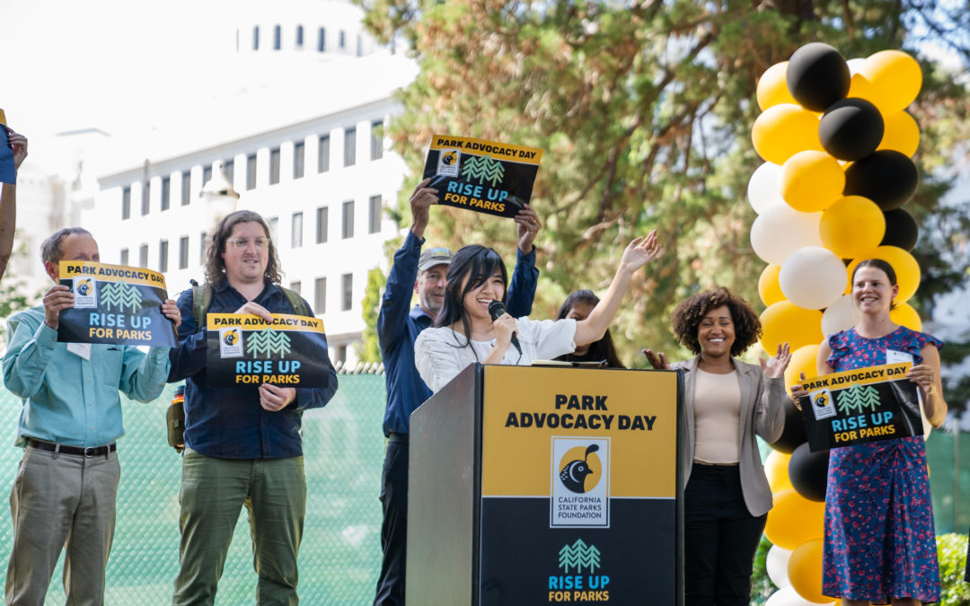 Photo of youth advocate speaking at podium on Park Advocacy Day in May 2022.